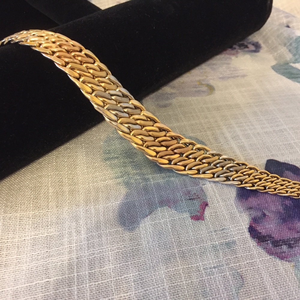 14 Kt Tri color.  Yellow, white and rose gold.